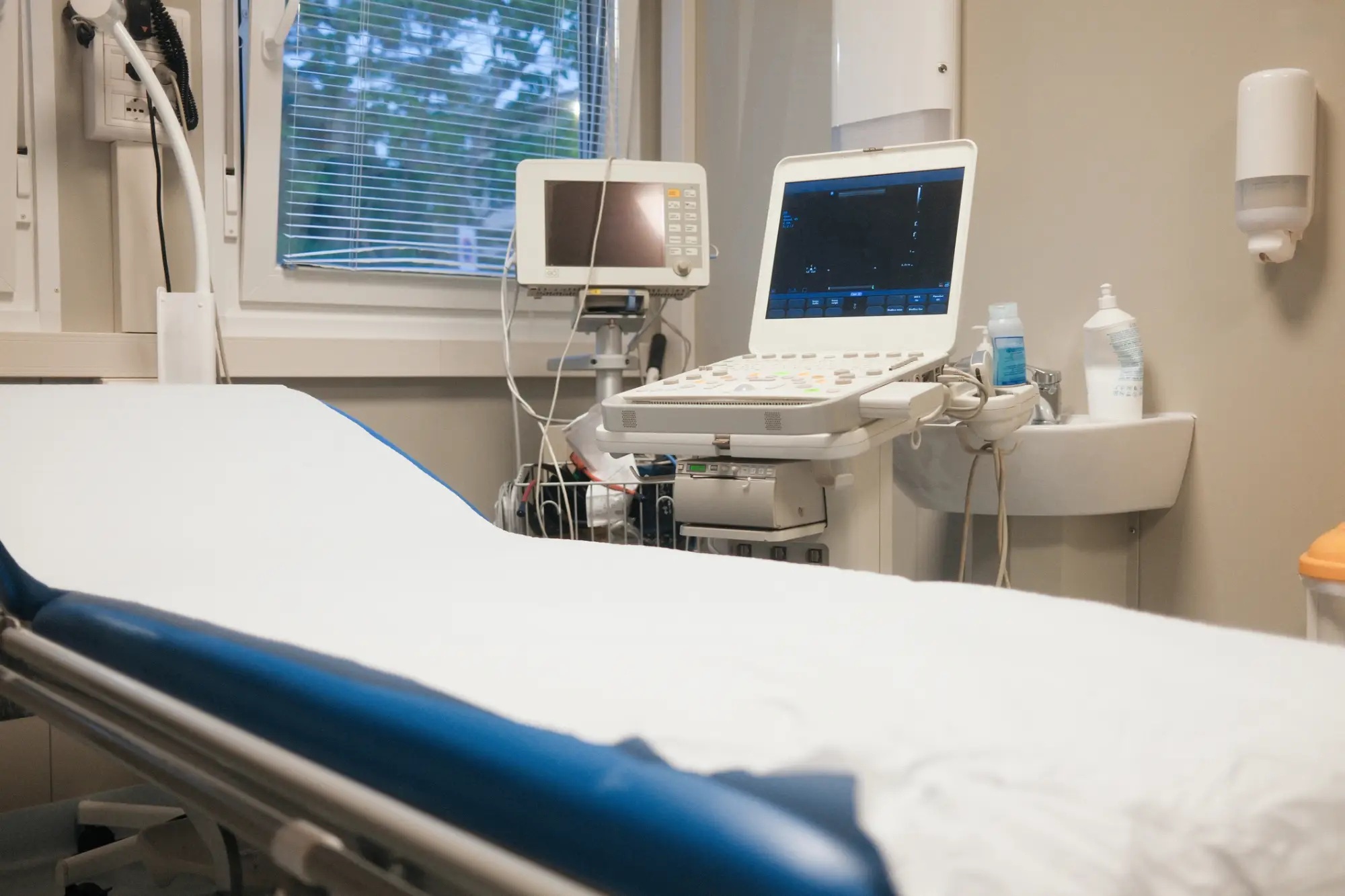 Ultrasound equipment in a clinical room.